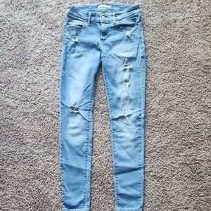 Women's Distressed Levi Blue Jeans